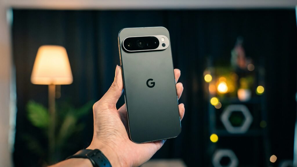 A person holding a cell phone in their hand