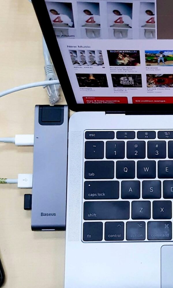 Silver laptop computer turned on