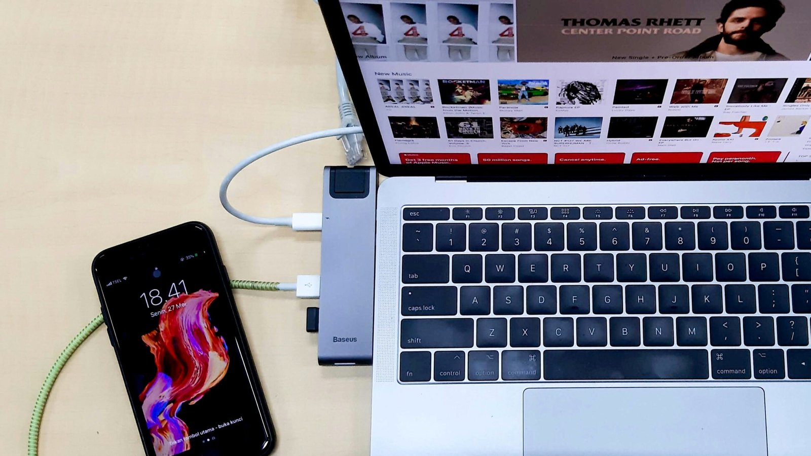 Silver laptop computer turned on